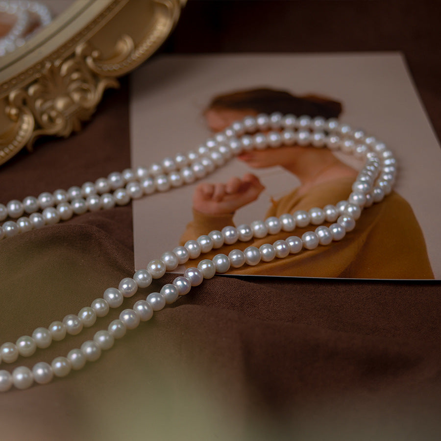 Customized Natural freshwater pearl necklace, multi-layer retro pearl sweater chain wholesale, long strong light nearly round and slightly flawed pearl