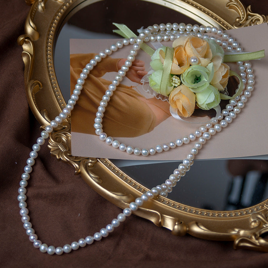 Customized Natural freshwater pearl necklace, multi-layer retro pearl sweater chain wholesale, long strong light nearly round and slightly flawed pearl